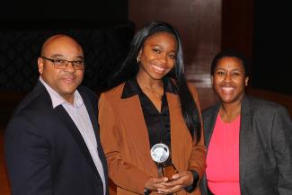 Nicole-Bethany Onwuka ’22 holding her award
