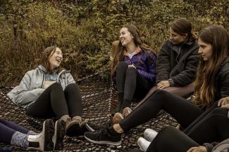 Students in a hammock