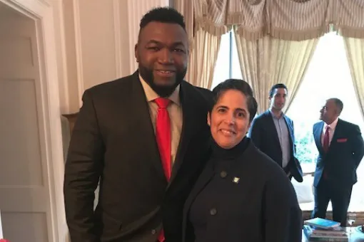 Shirley M. Collado and David Ortiz pose for a photo