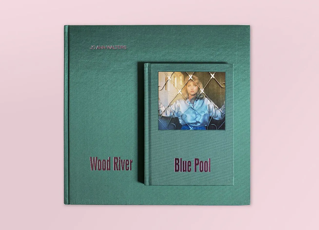 One large and one small teal book