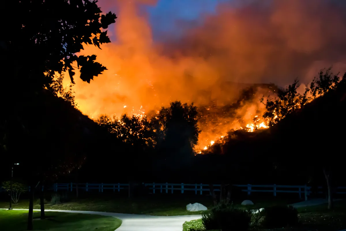 Wild fire in the distance at dusk