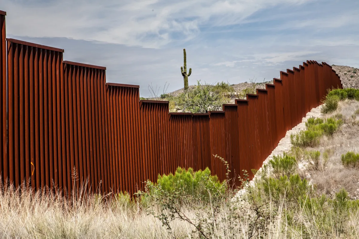 A rusty metal wall in the desert