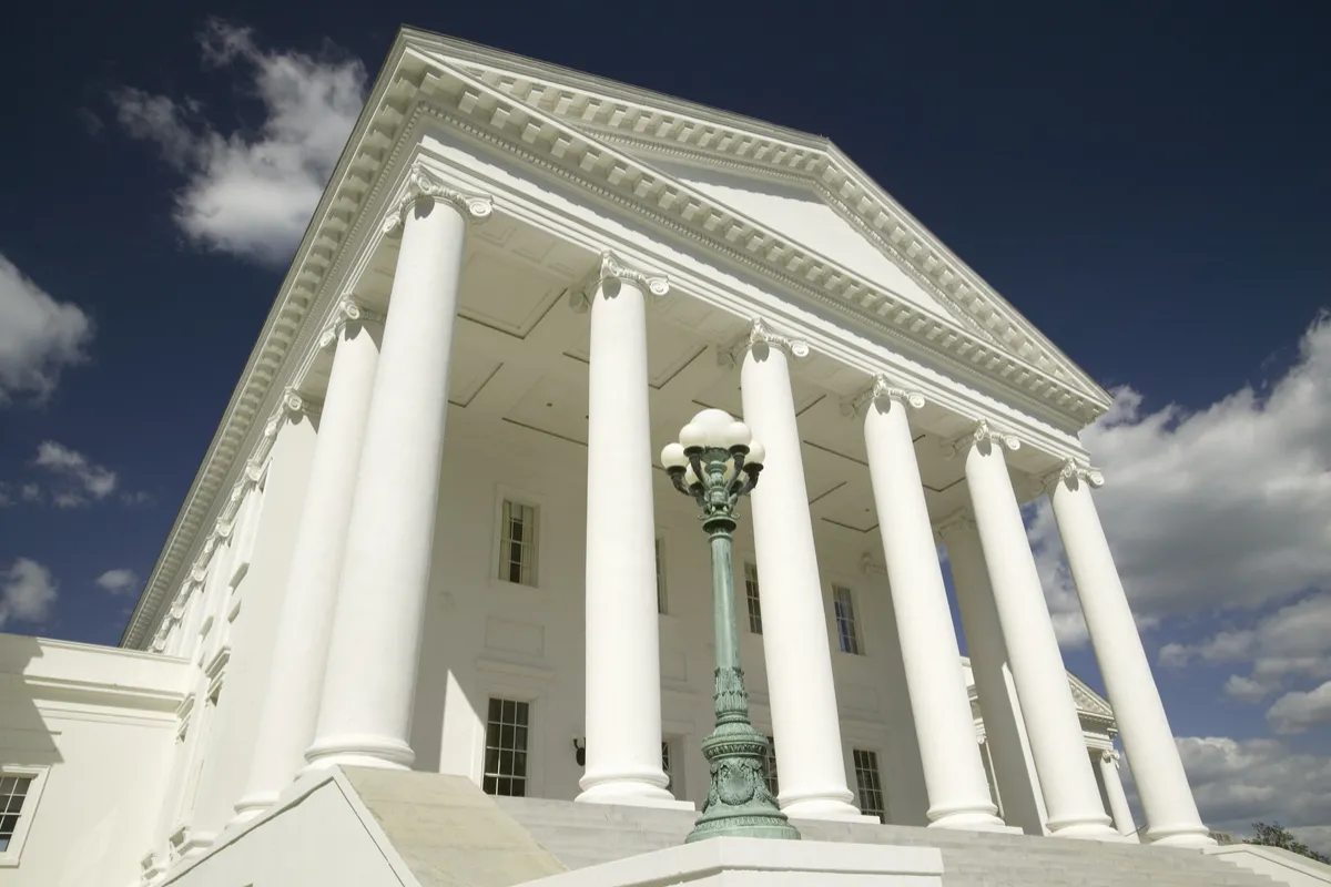 A white, Greek style building with columns