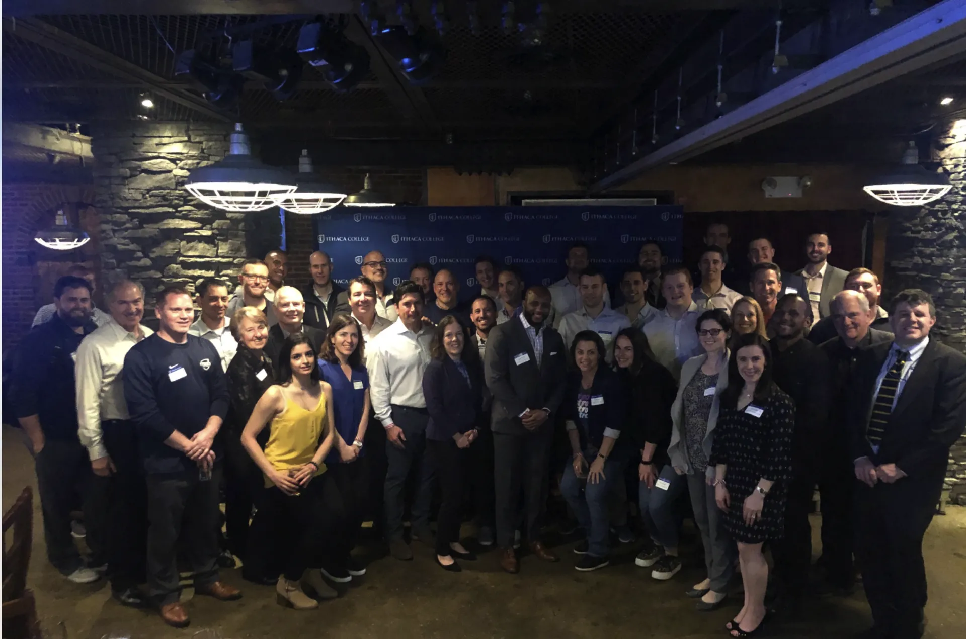Group shot of attendees at Night of Champions Social