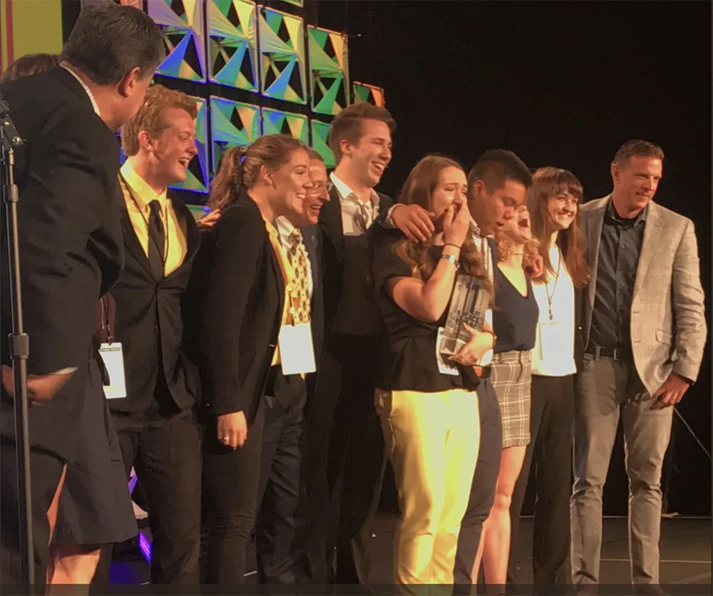 group of students winning an award