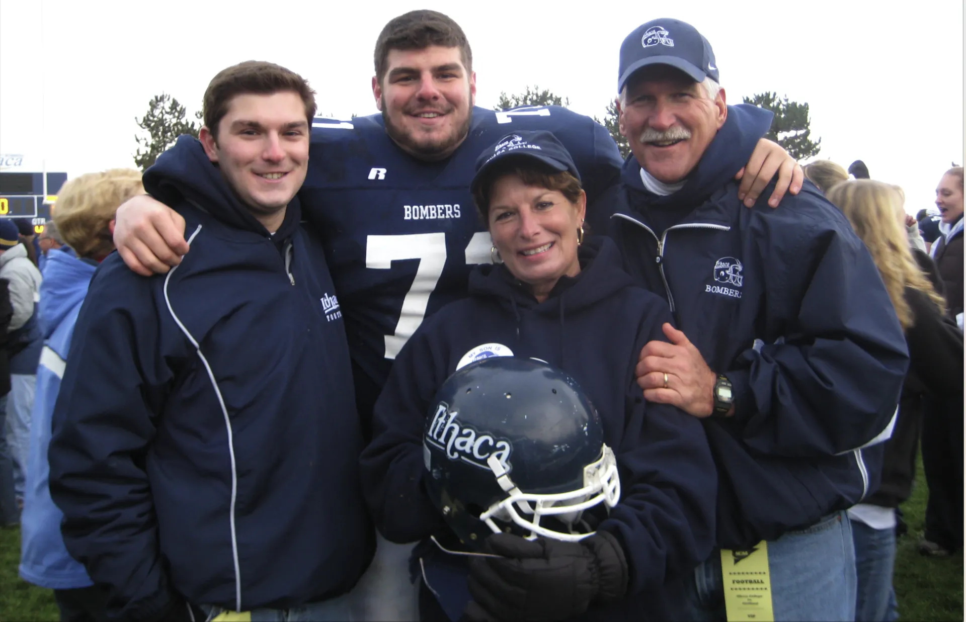 Kevin, Mark, mom Linda '75, and dad Tom '75.
