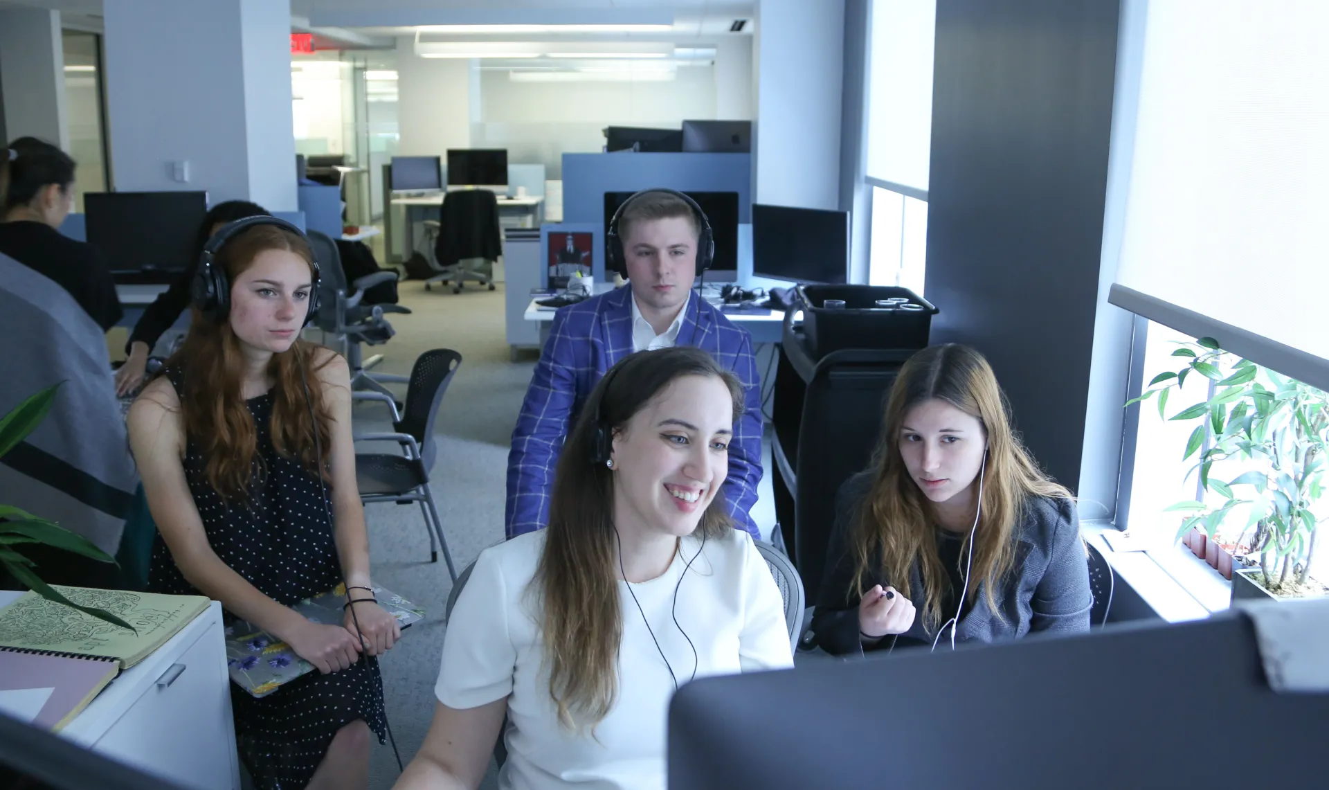 Ithaca College Students at a computer