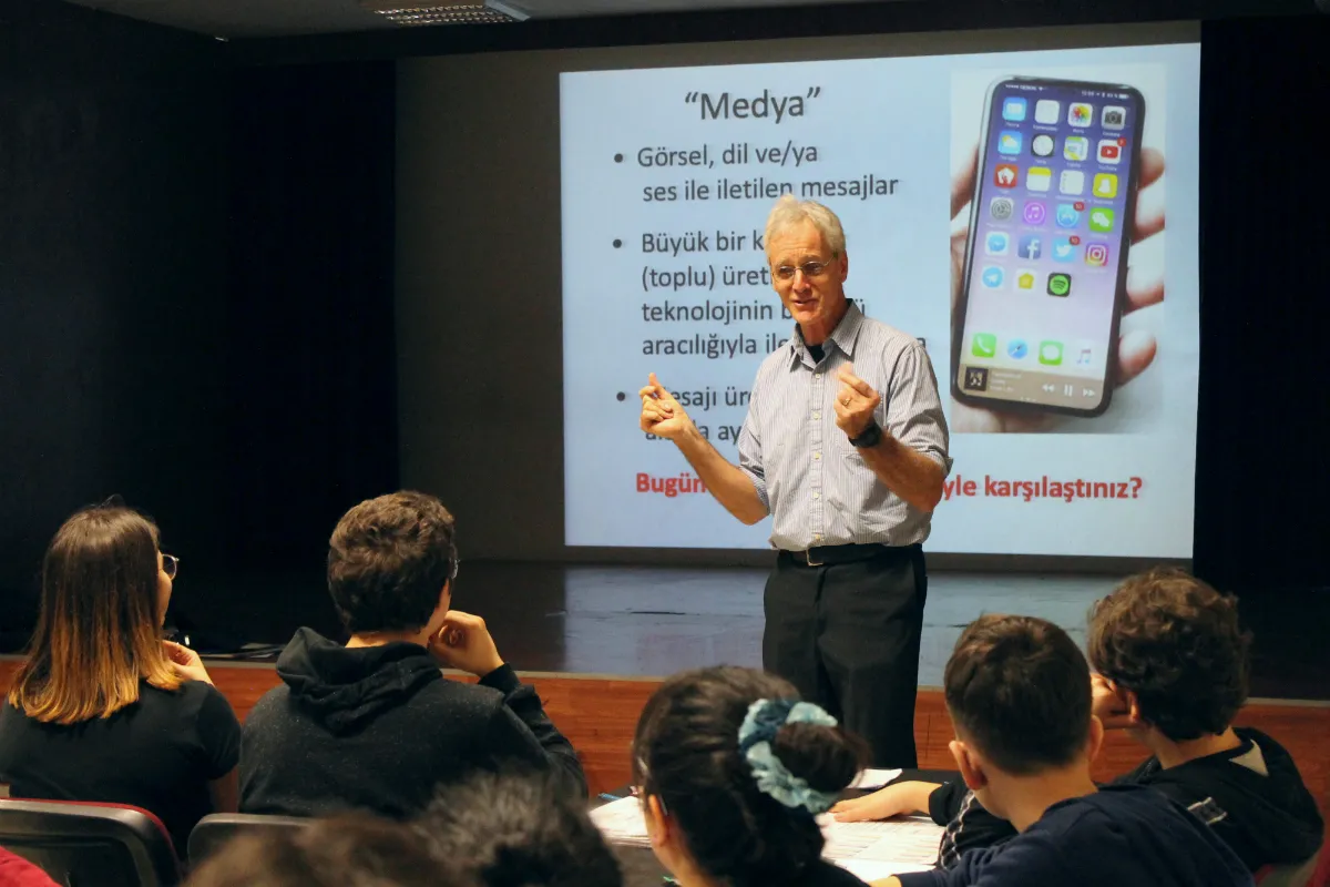 A man speaking to an audience