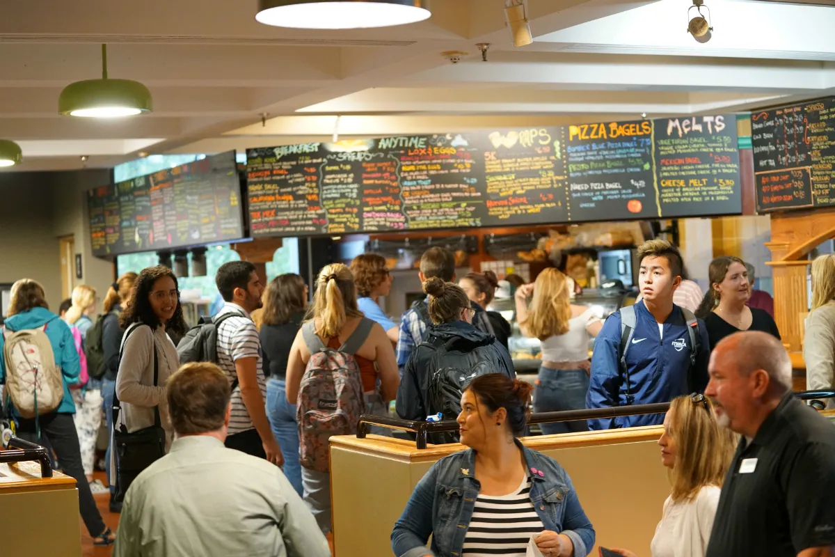 Young people outside a food court location