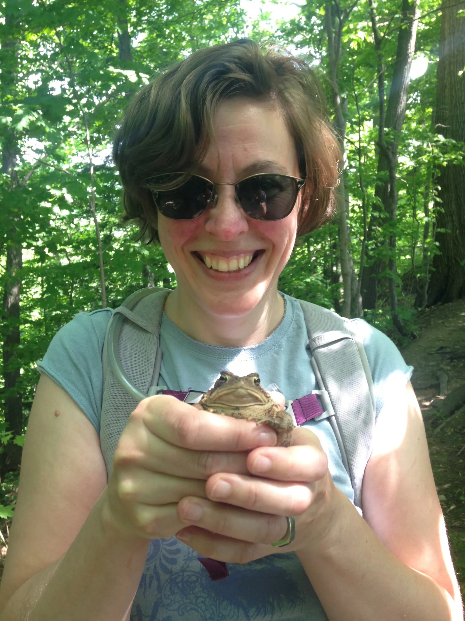 Leann Kanda holding a frog