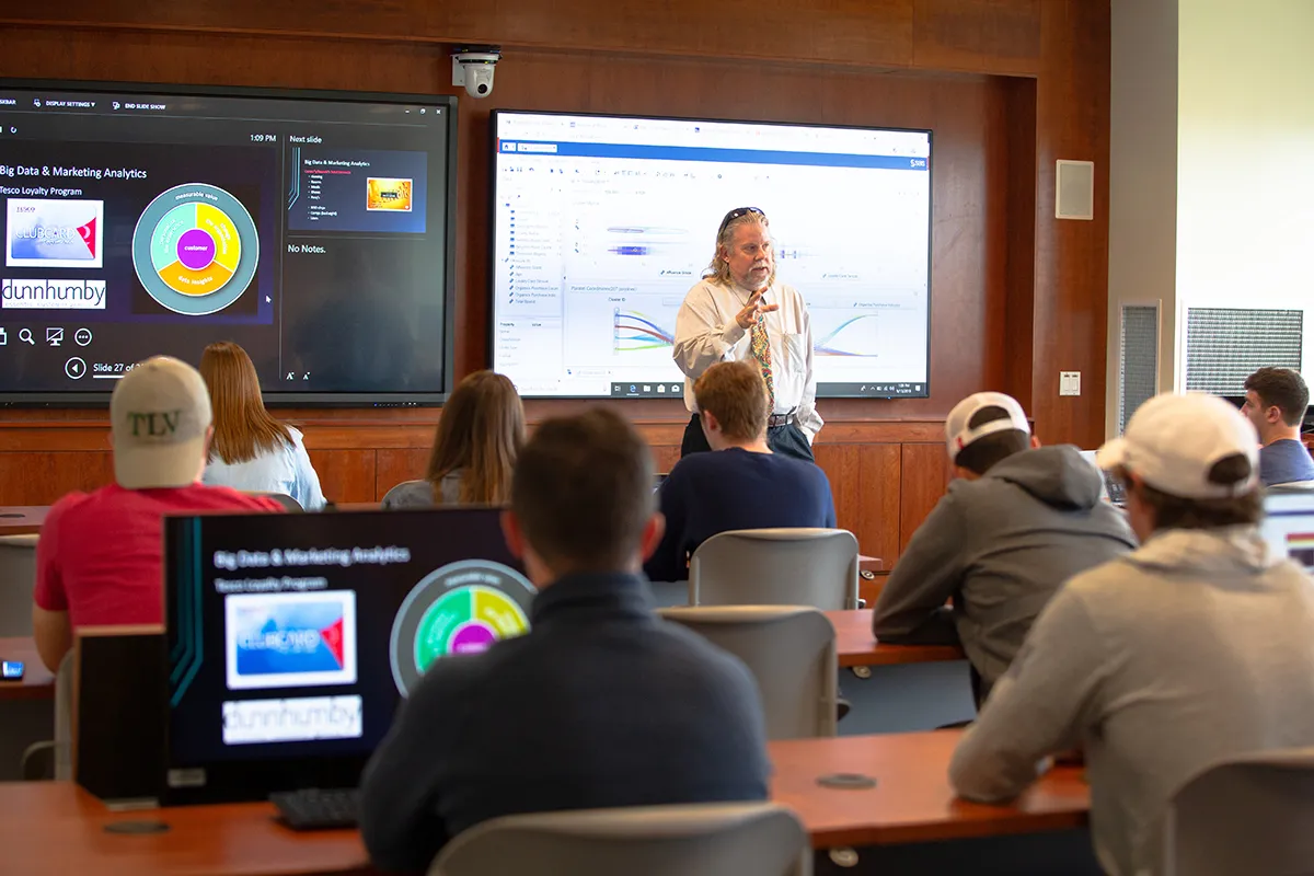 professor teaches in a computer lab
