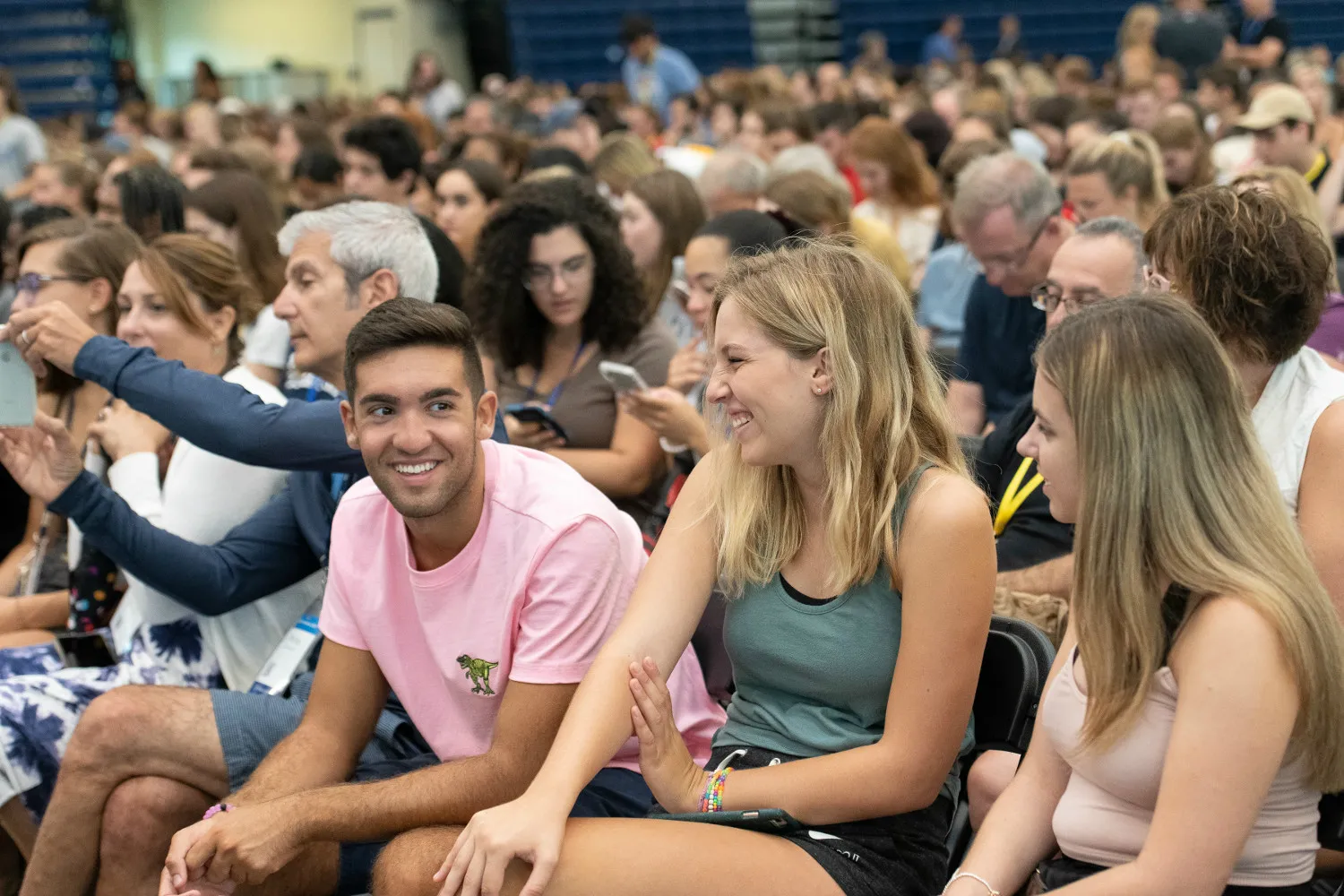 A crowd of people sitting