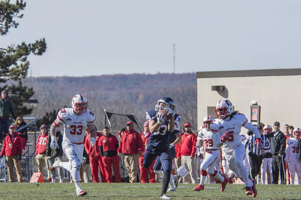 football player catching a pass