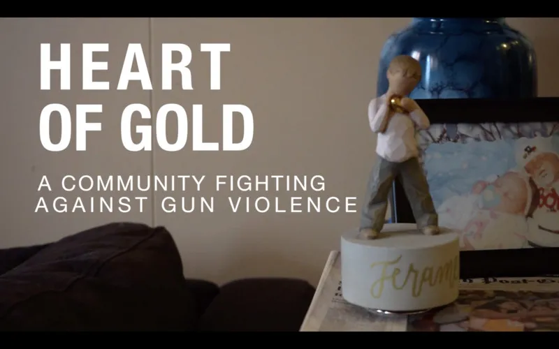 A statue on a desk with the words "HEART OF GOLD" superimposed