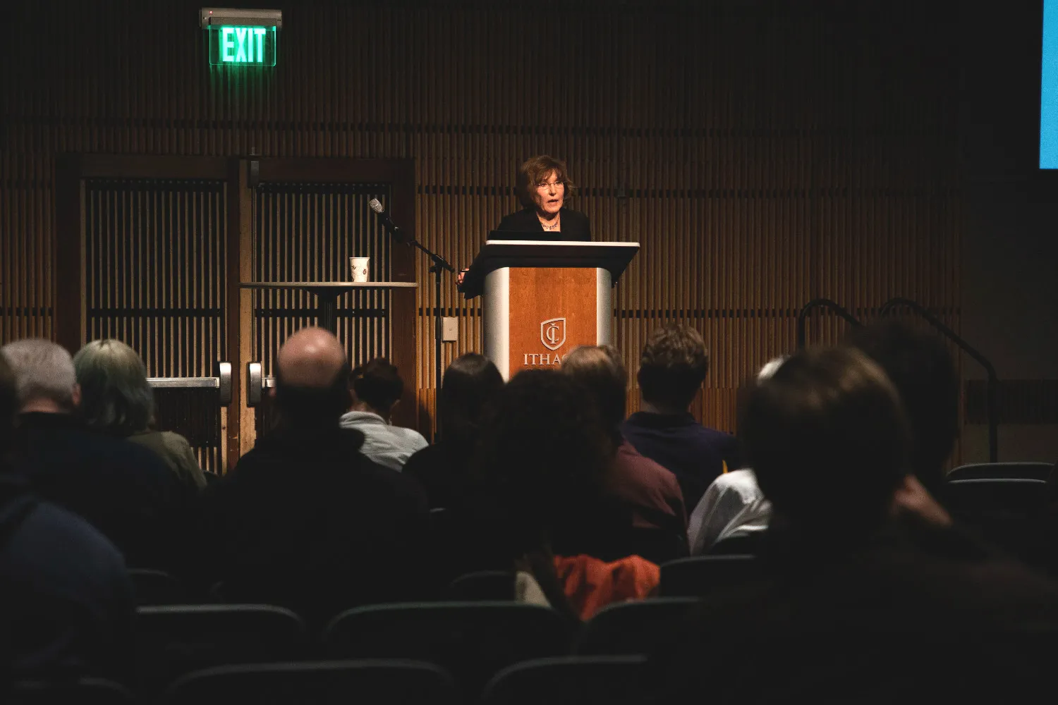 A woman speaking at a podium