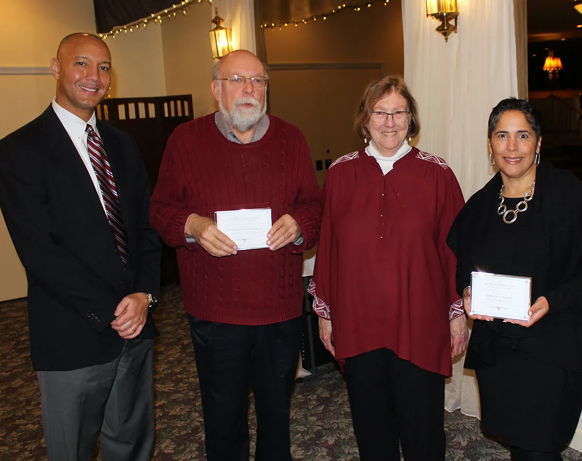 people standing with awards