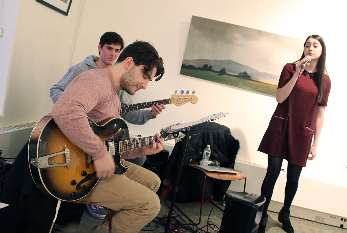 students perform music