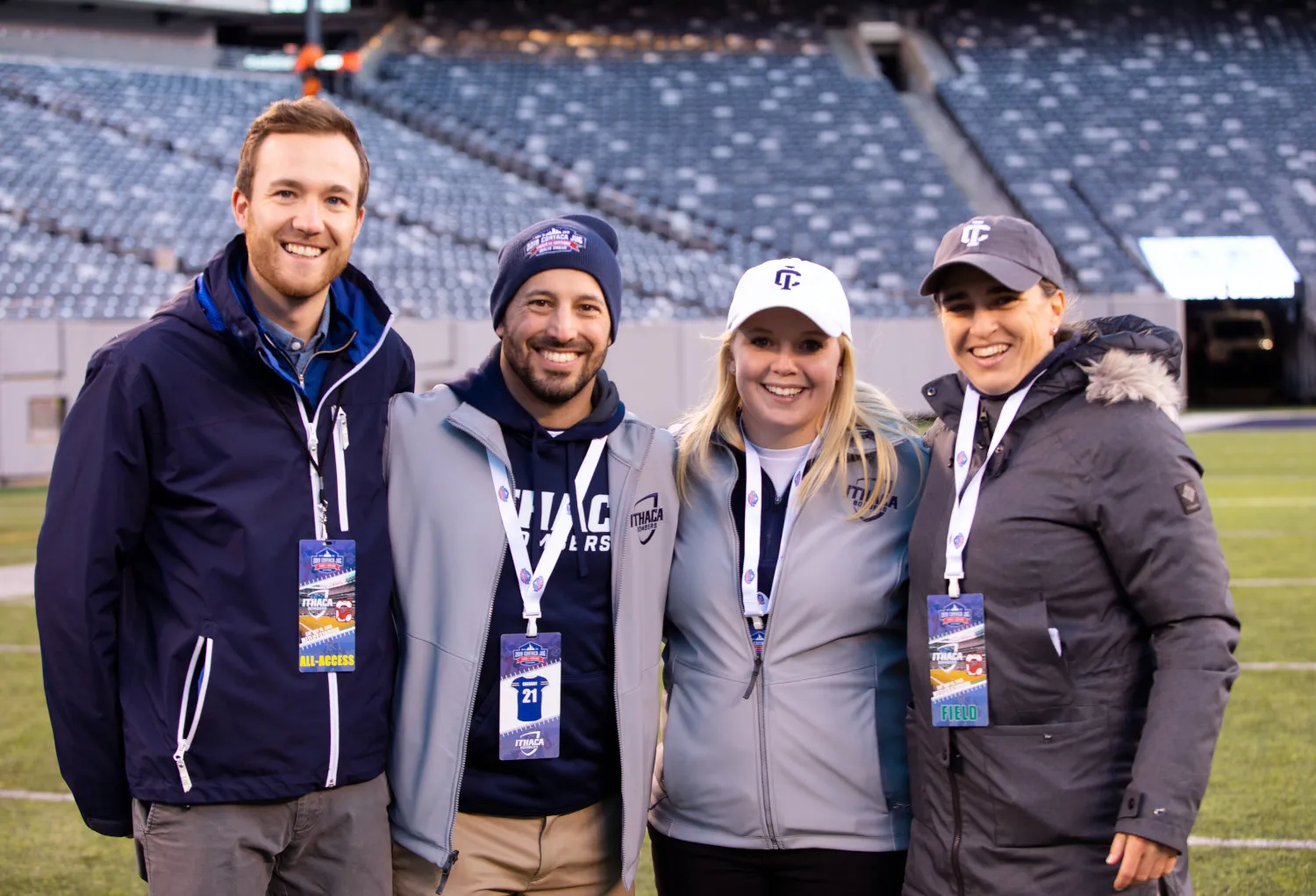 people on the field after a football game