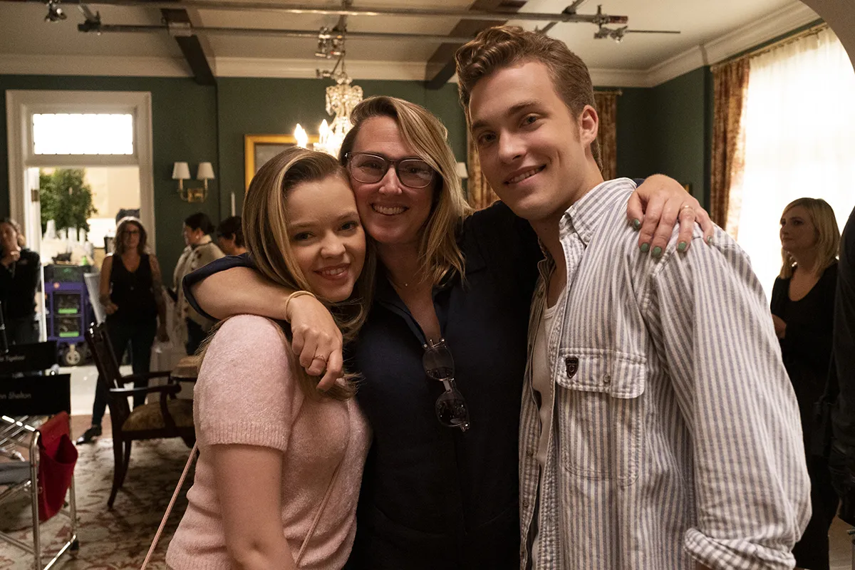 three people embracing