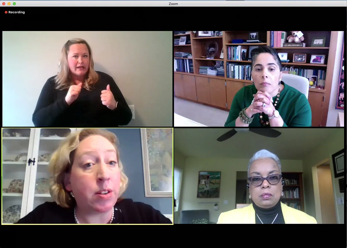 four people speaking on screen