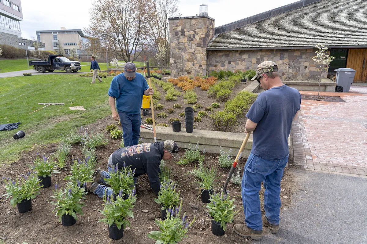 Facilities staff working outside. 