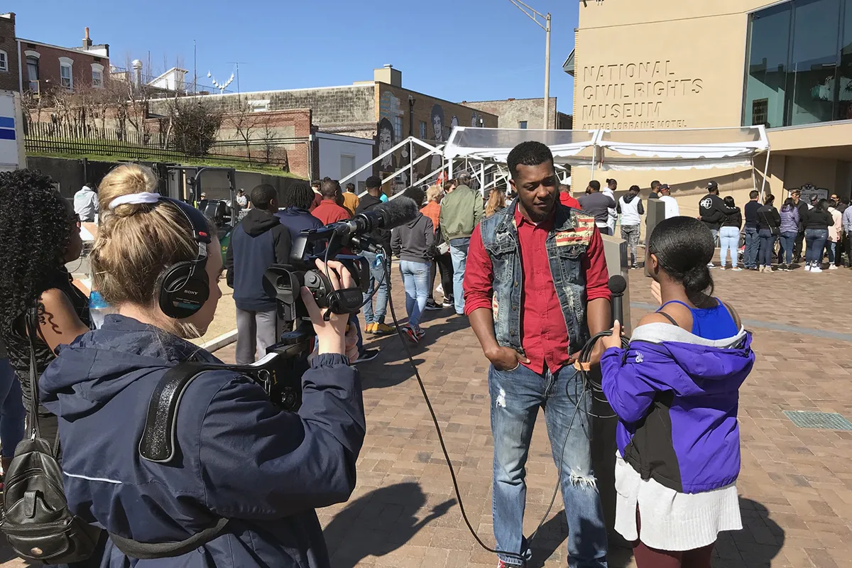 student interview someone outside the National Civil Rights Museum