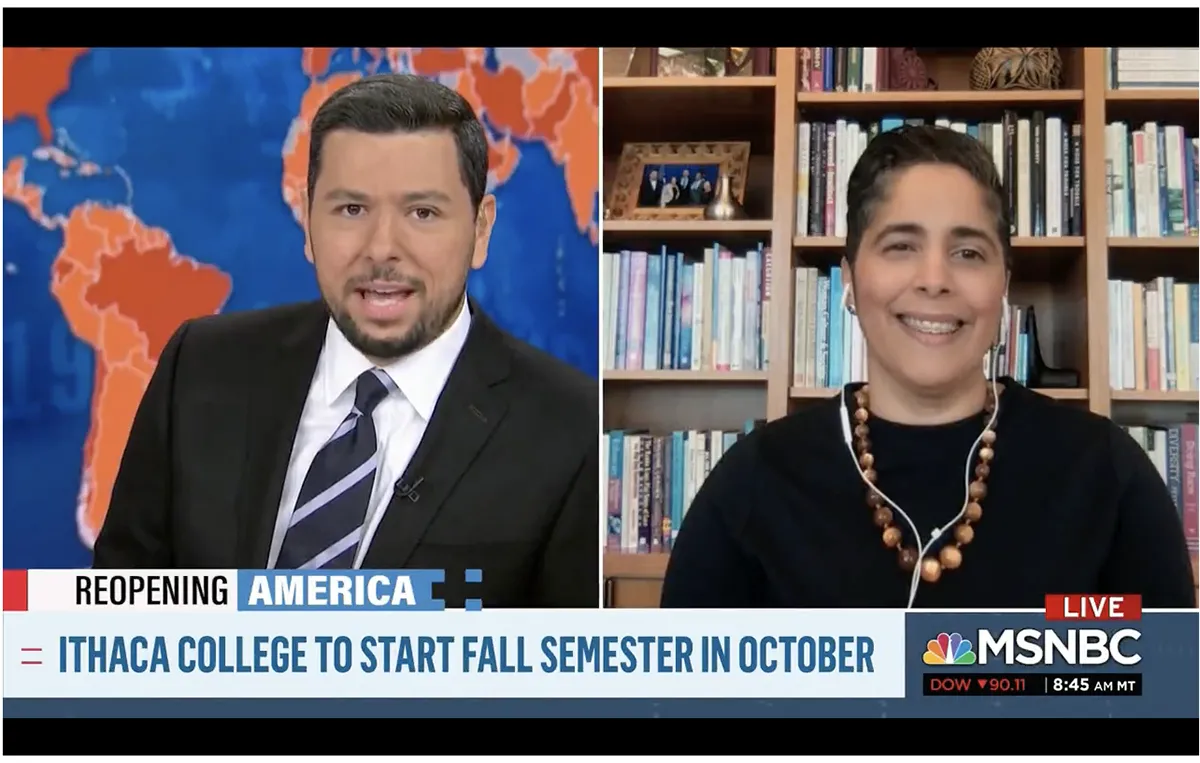 man interviewing woman on television