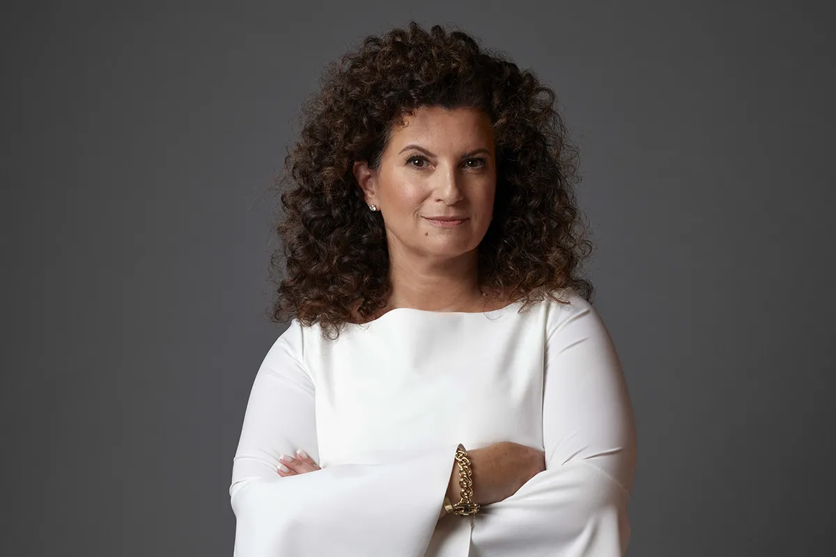 woman with arms folded