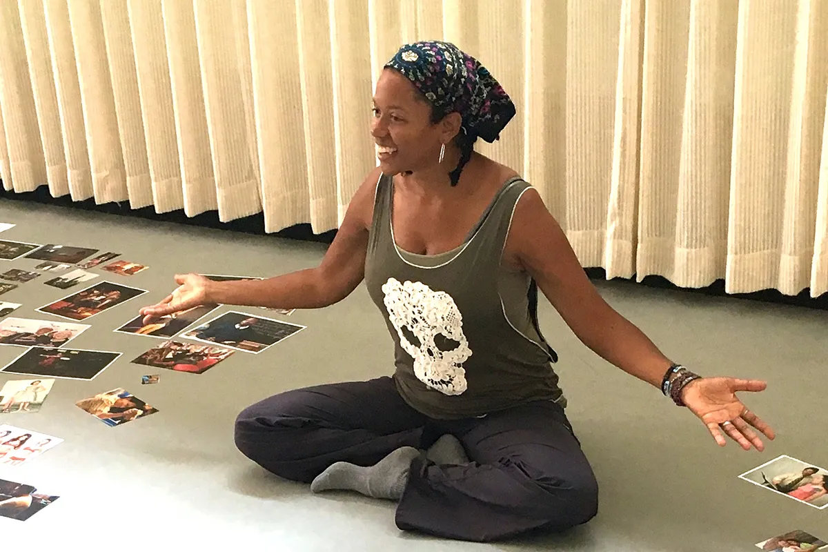 professor sitting on floor