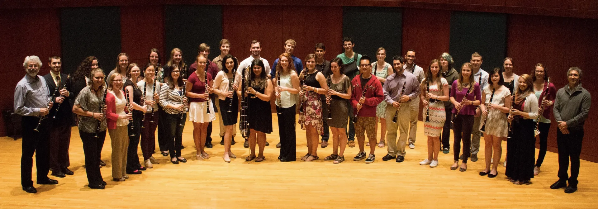 Clarinet Studio stands on stage smiling