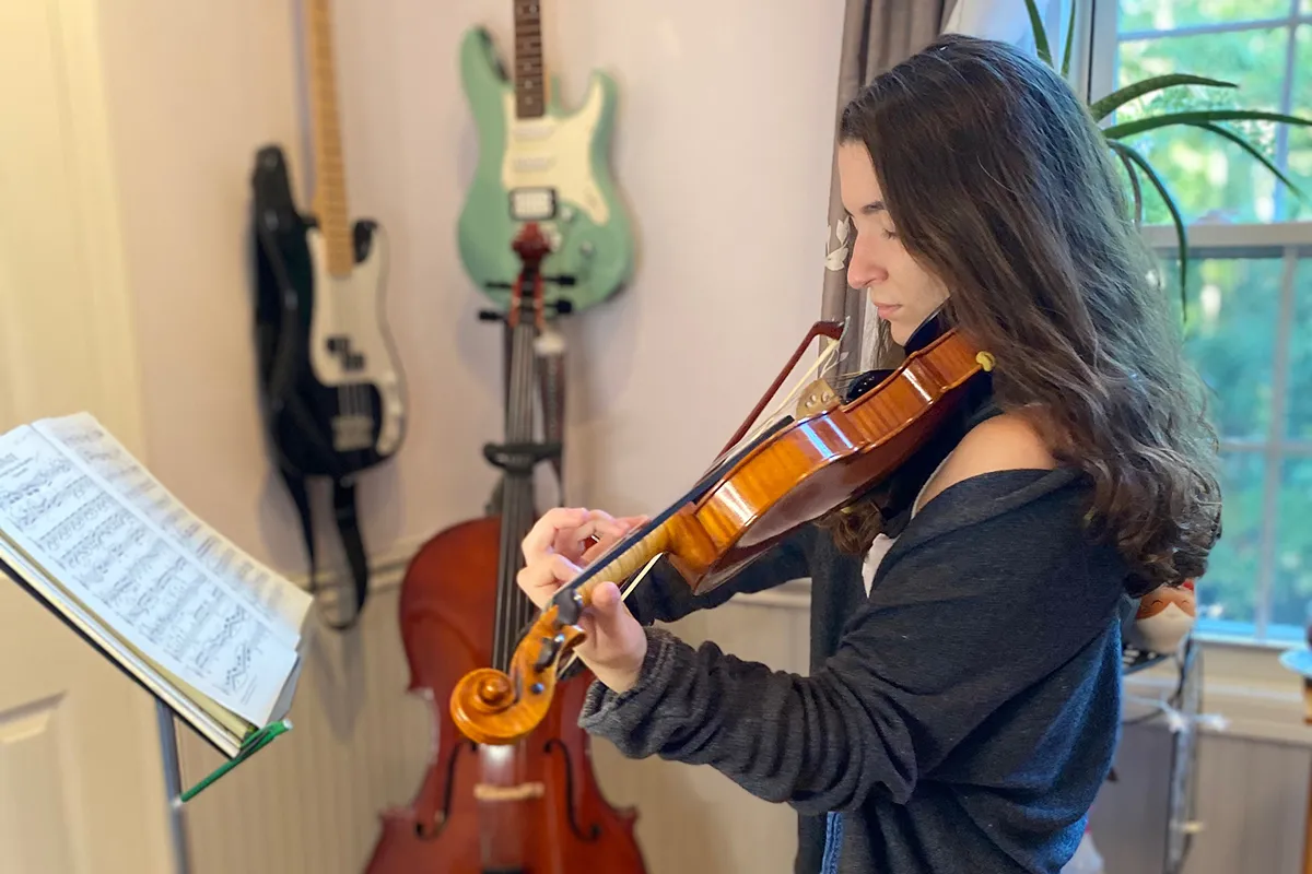 student playing violin