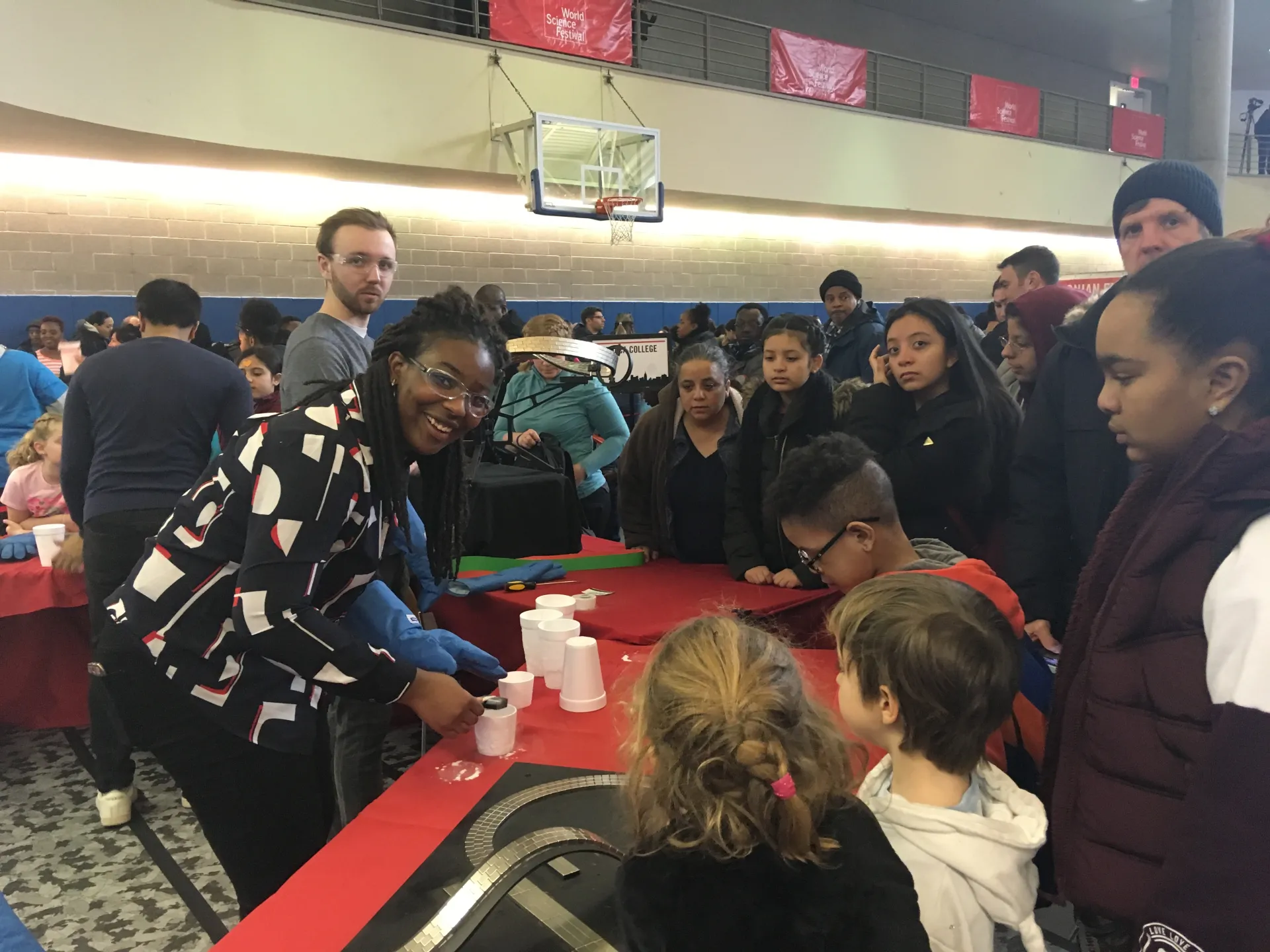 Oluwasekemi Odumosu '20 and Joshua Schmidt '23 demonstrating the low-temperature tracks at the World Science Fair.