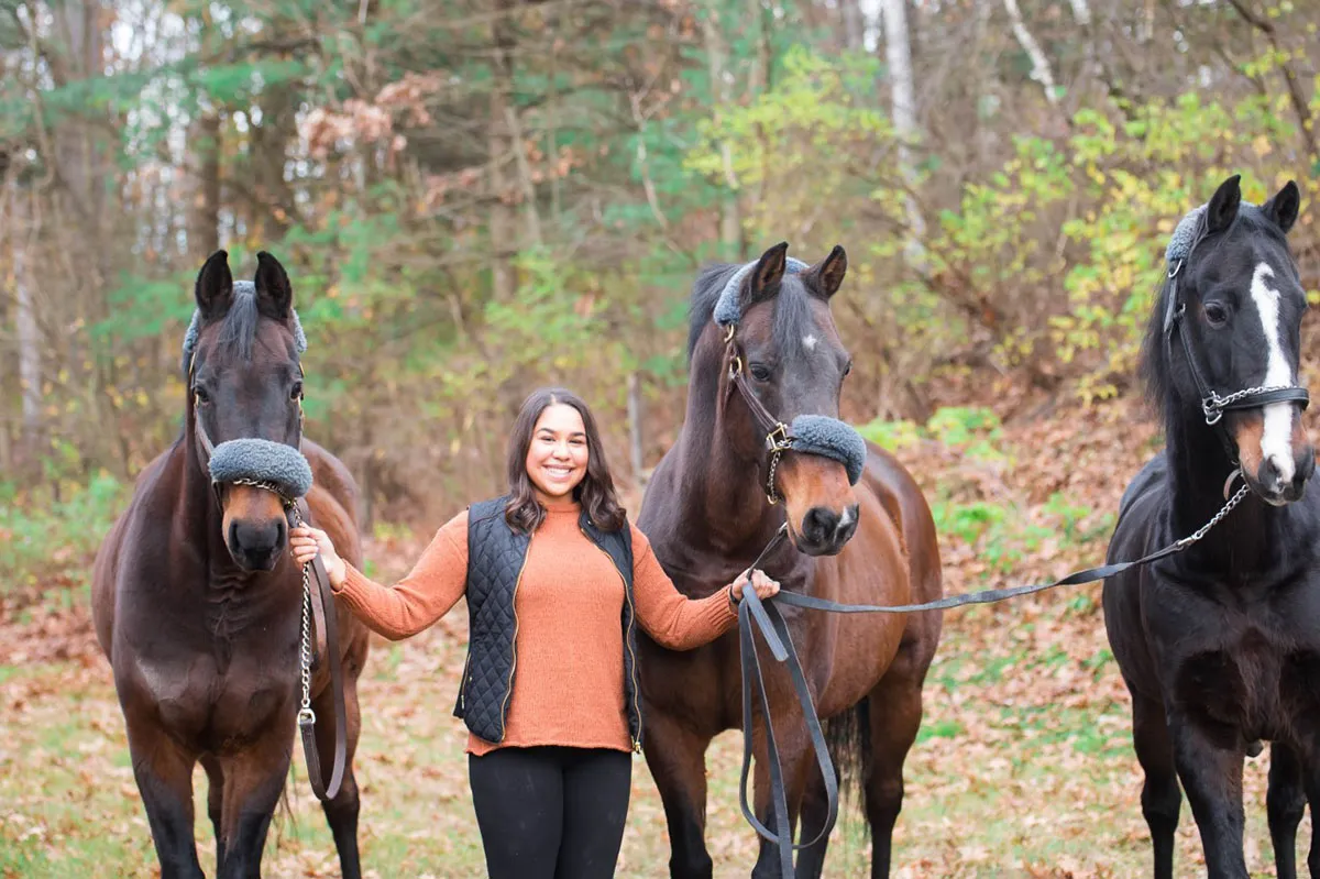 Rahman with her horses.