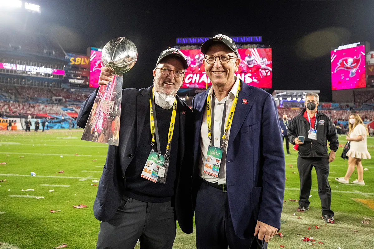 owners with the Vince Lombardi Trophy