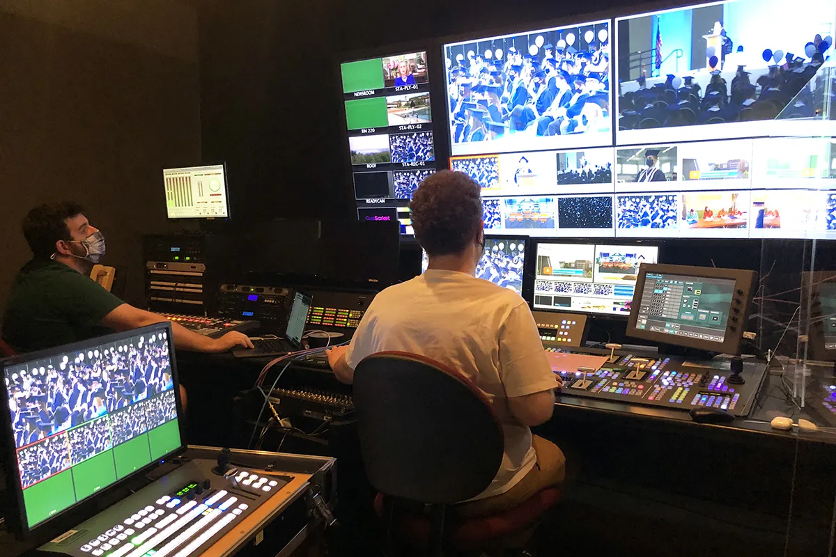 people working behind the scenes