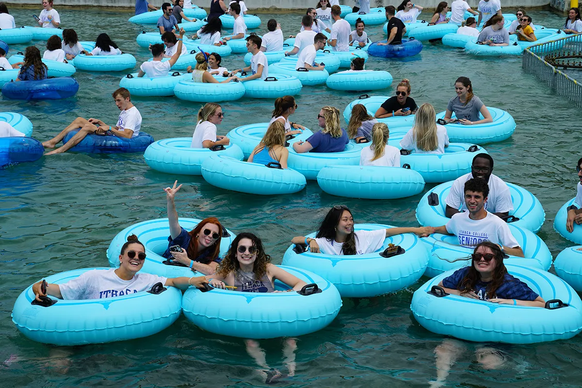 Students in inner tubes in Dillingham Fountain