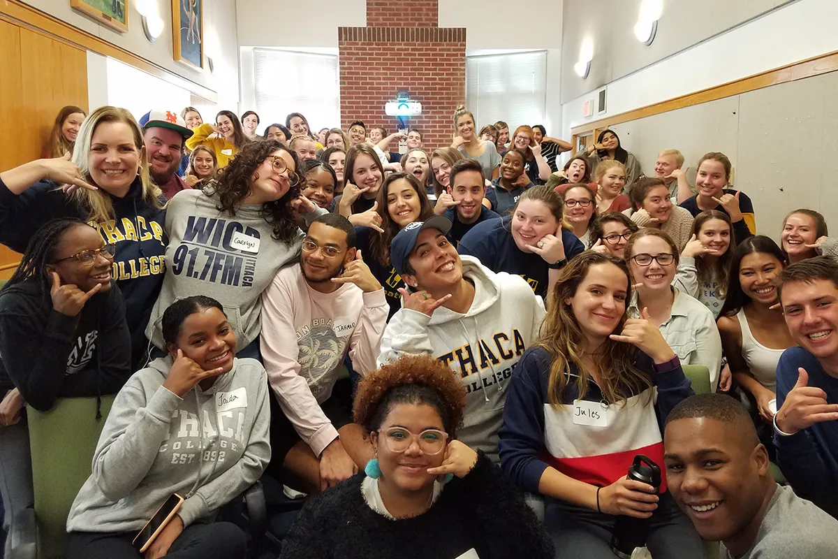 President Collado with students