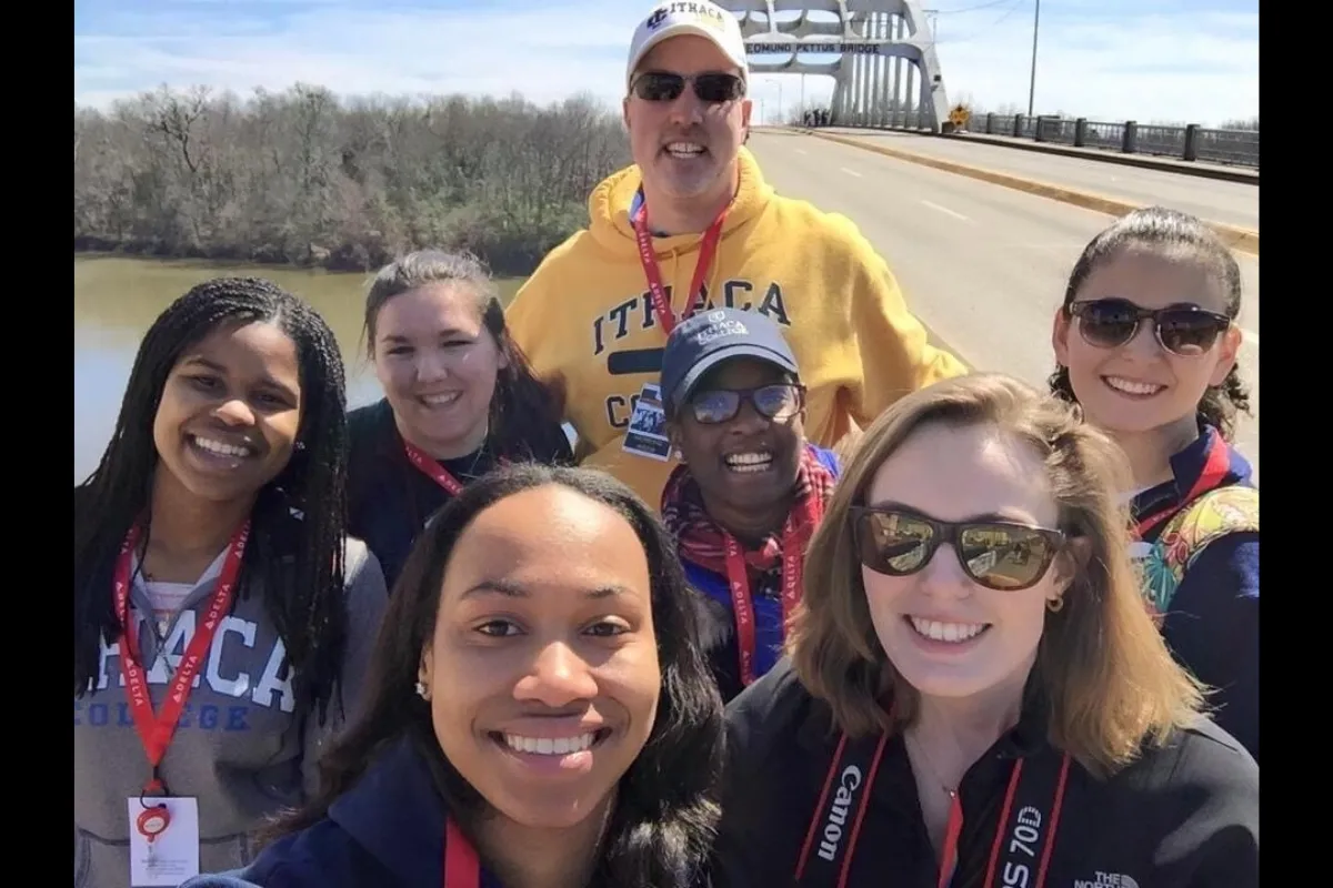 Sarah McCloskey with several other students and professor James Rada