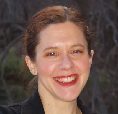 Dr. Chrystyna Dail outside and smiling