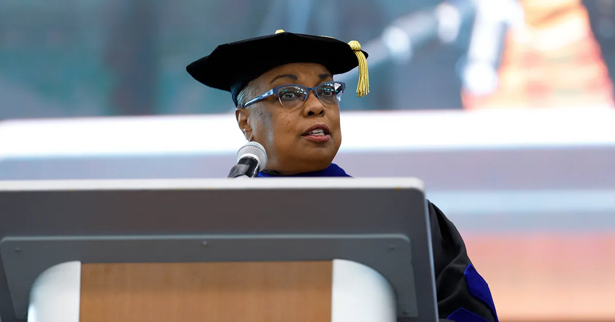 La Jerne Terry Cornish standing at a lectern