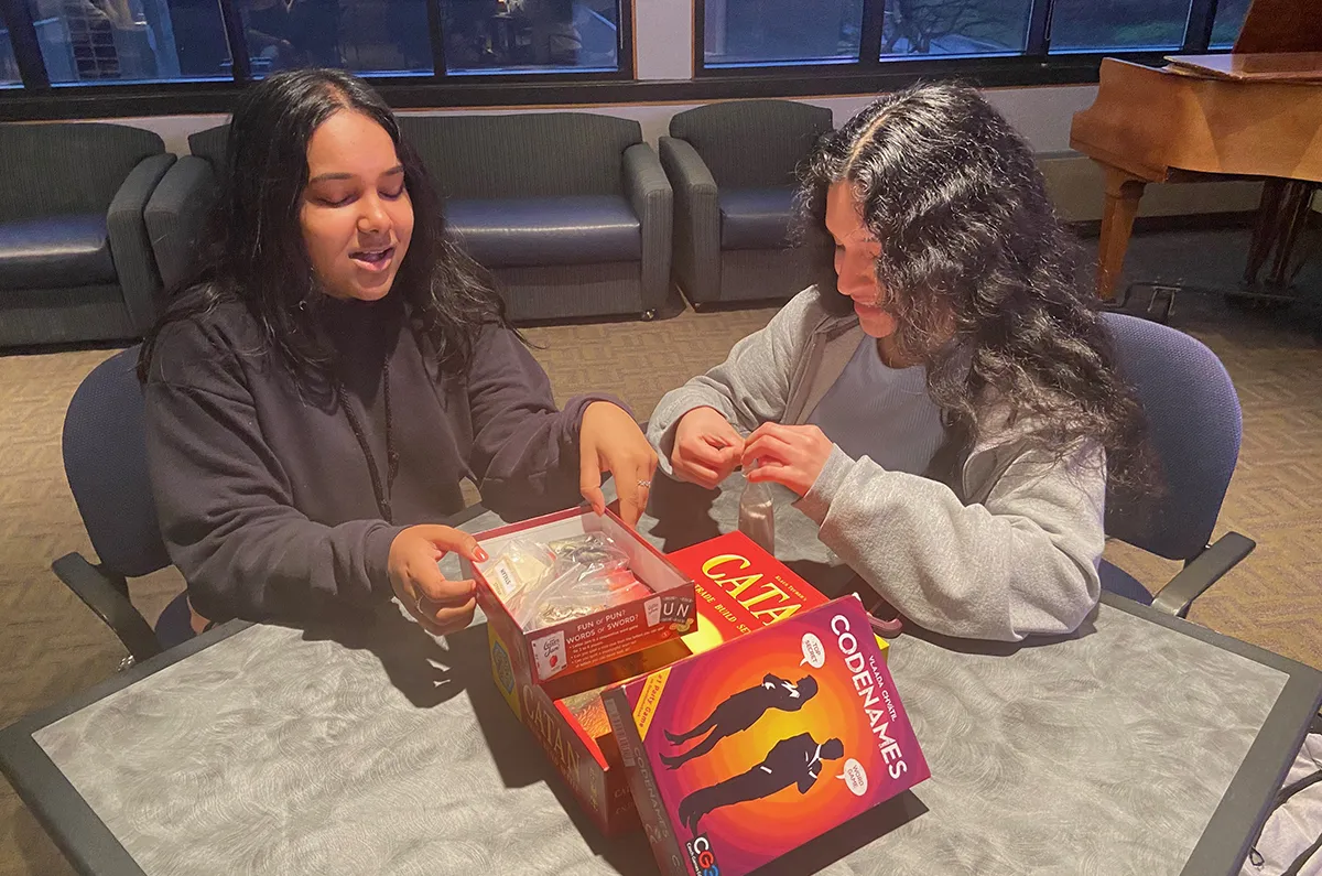 Students playing board games)
