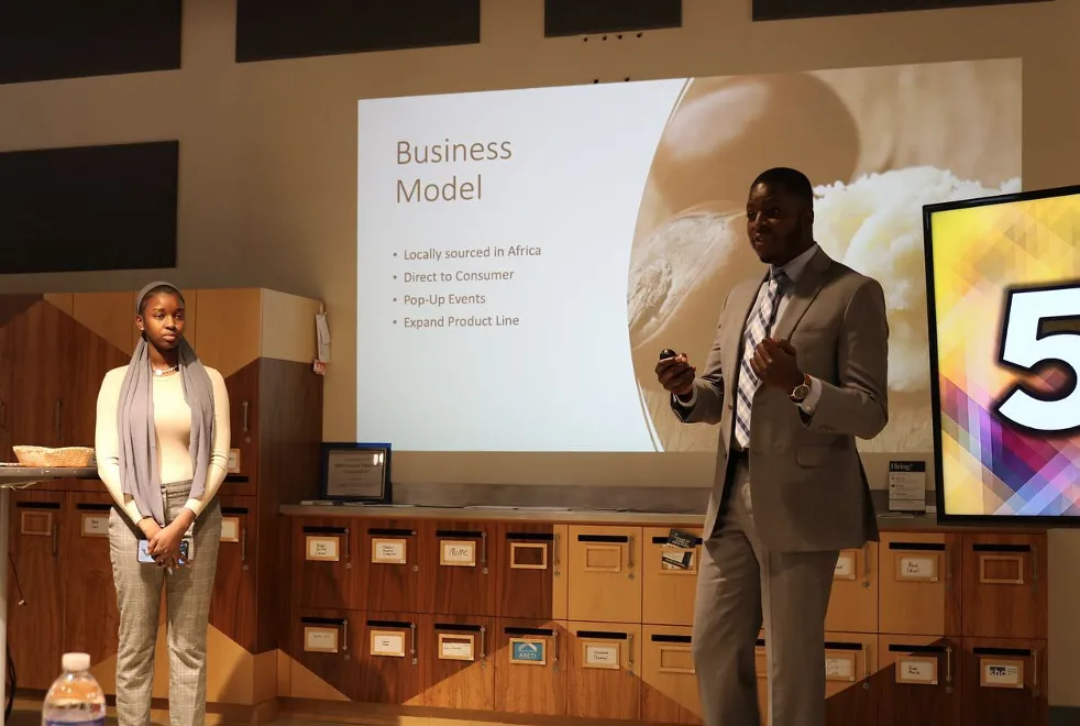 Absa Beye ’22 and Shevori Gene '23 presenting