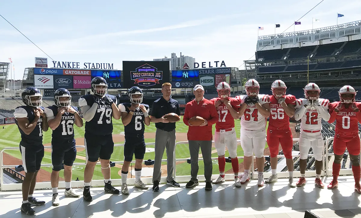 Ithaca and Cortland players and coaches inside Yankee Stadium