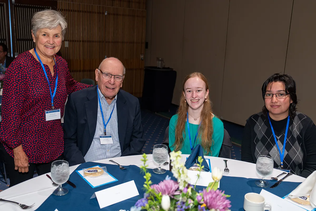 Carrie and Art Ostrander with students