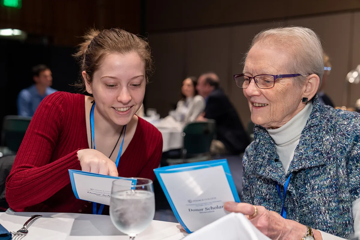 Student sitting with a donor