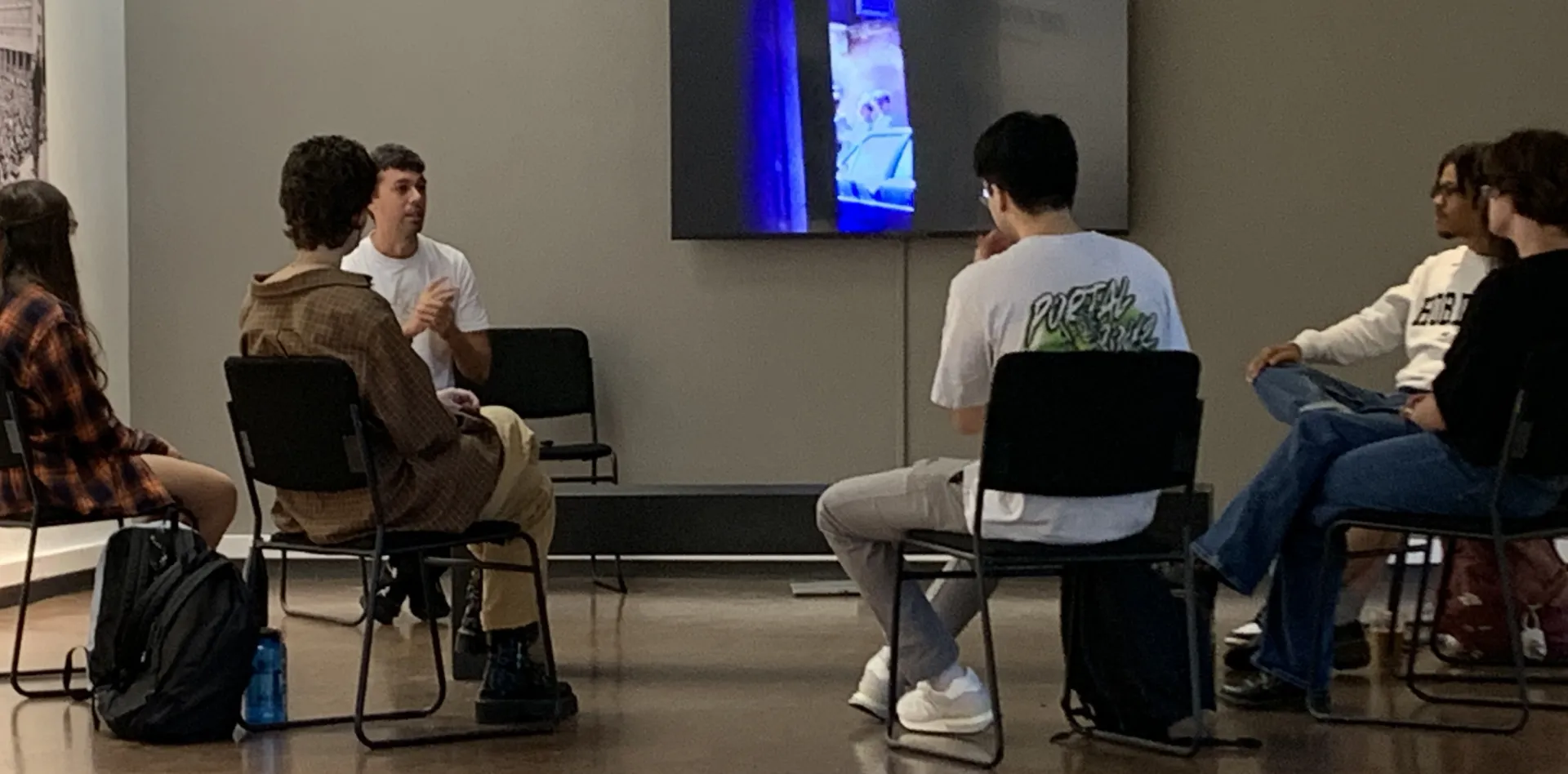 Felice Moramarco speaks to students at a curatorial workshop