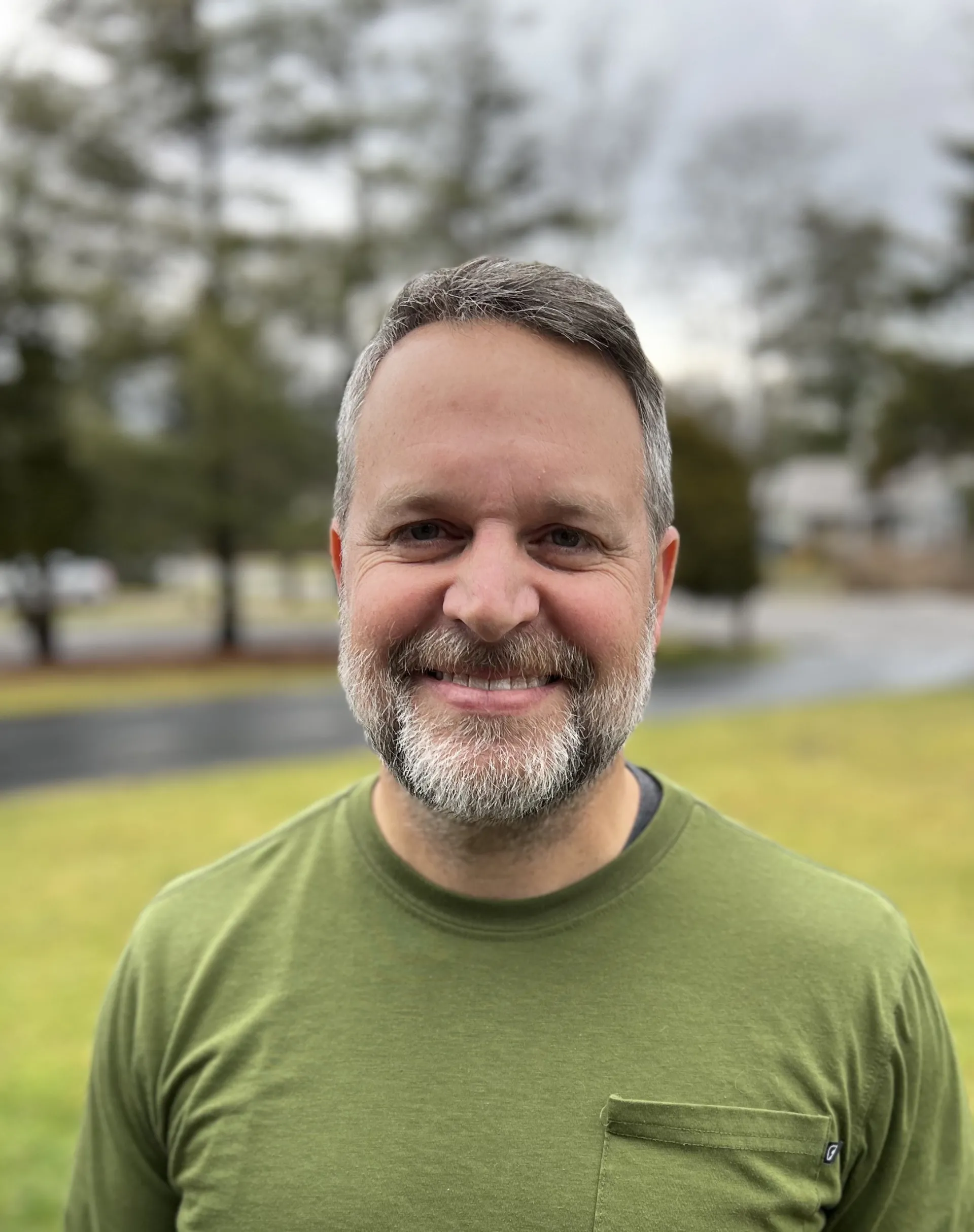Dr. Patrick Lewis, outside on an overcast afternoon