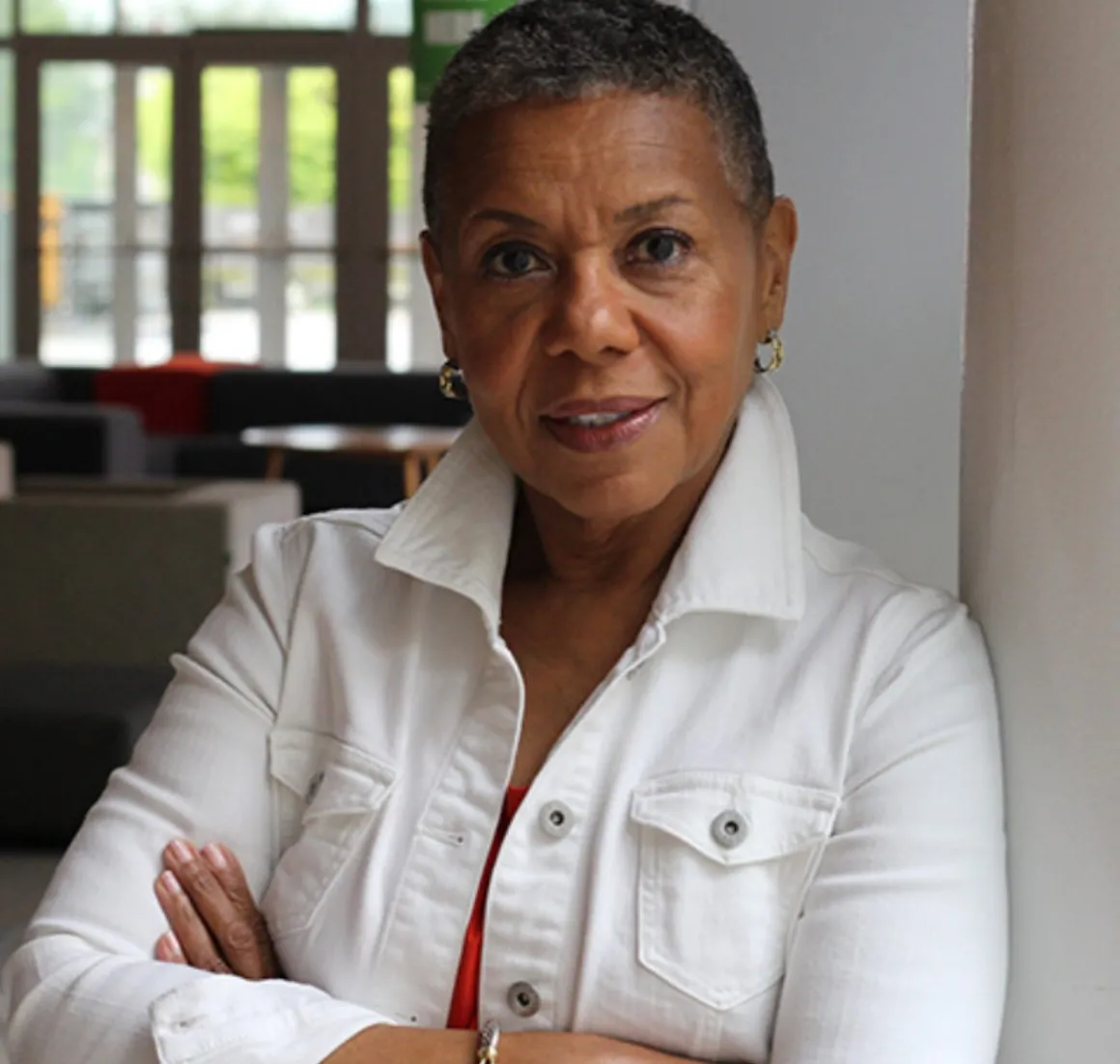 Woman wearing white shirt.