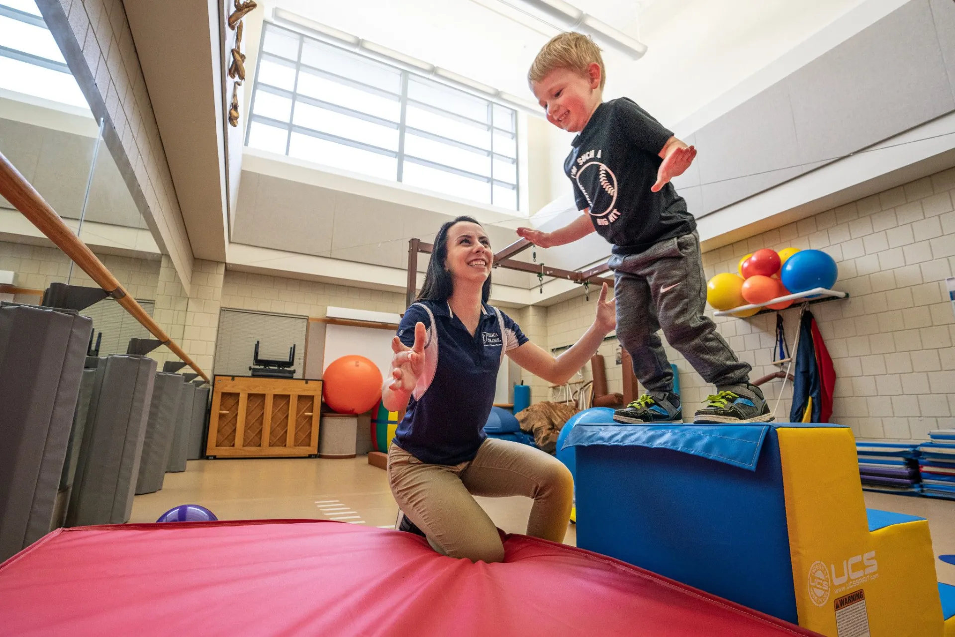 child jumping off a step