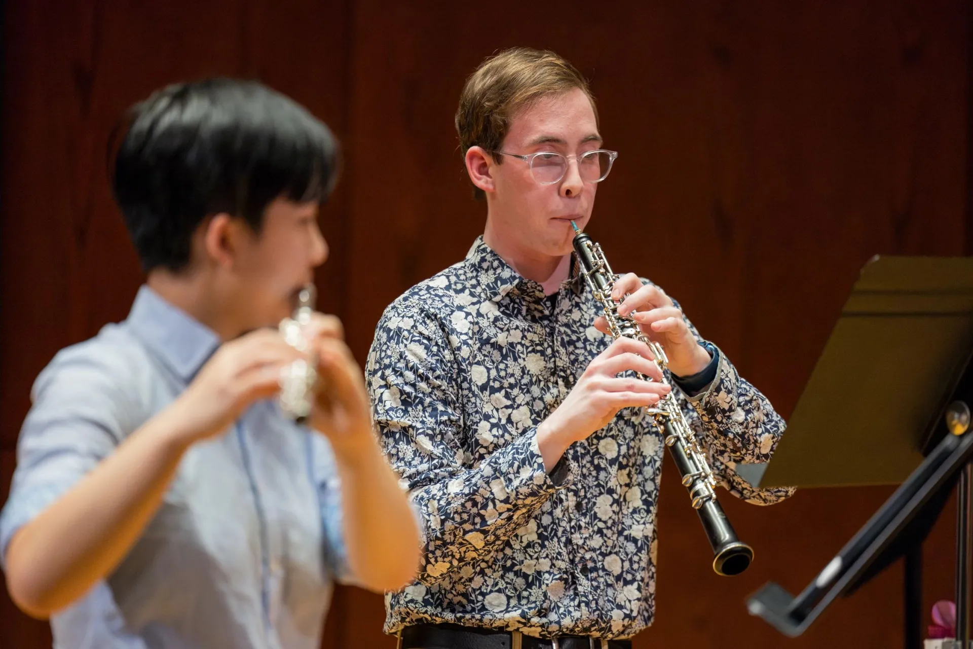 Students playing flute and oboe
